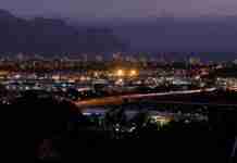 Do You Have What It Takes To Be a Rover? RoverTreks — A nighttime view of Strand & Gordon's Bay from Somerset West, South Africa