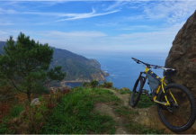 The 5 Top Reasons Why You Should Travel With a Bike Beautiful view near San Sebastian, Spain.