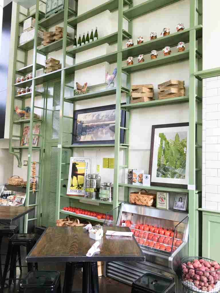 Low Country Produce - Display racks on old Post Office walls