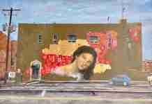 Fascinating Street Art: The Intriguing Venus of the Springs Mosiac at Hot Springs "Venus of the Springs", a painting by Artist Patrick Cunningham. The painting is the source of imagery for a mural as a work in progress on the back of the Post Office building in downtown Hot Springs, Arkansas, October 13, 2022.