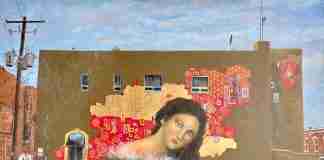 "Venus of the Springs", a painting by Artist Patrick Cunningham. The painting is the source of imagery for a mural as a work in progress on the back of the Post Office building in downtown Hot Springs, Arkansas, October 13, 2022.
