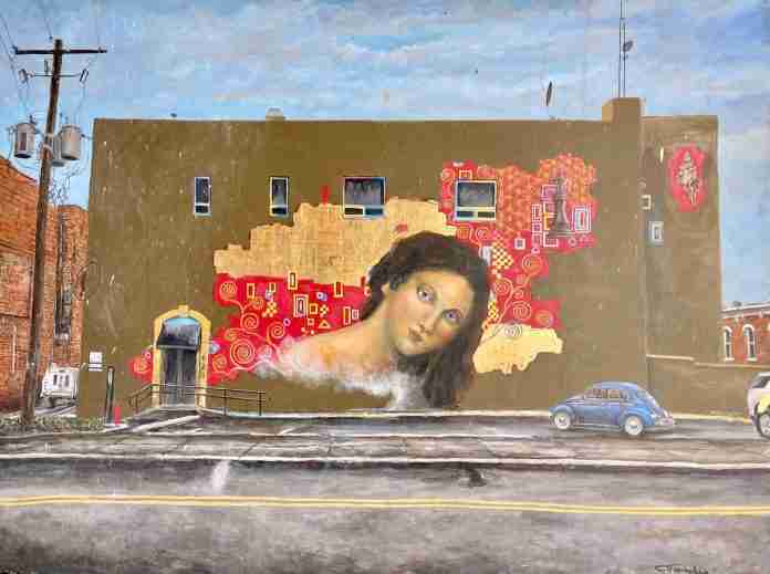 "Venus of the Springs", a painting by Artist Patrick Cunningham. The painting is the source of imagery for a mural as a work in progress on the back of the Post Office building in downtown Hot Springs, Arkansas, October 13, 2022.